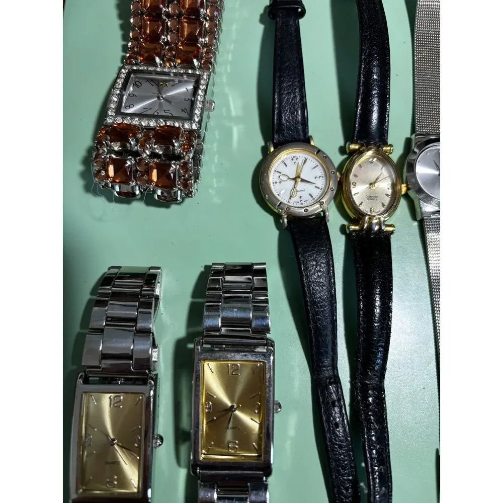 Lot of 12 men's and women's unbranded watches, untested
